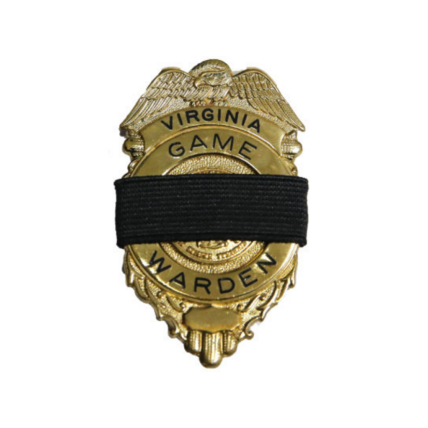 Un badge doré de garde-chasse de Virginie.